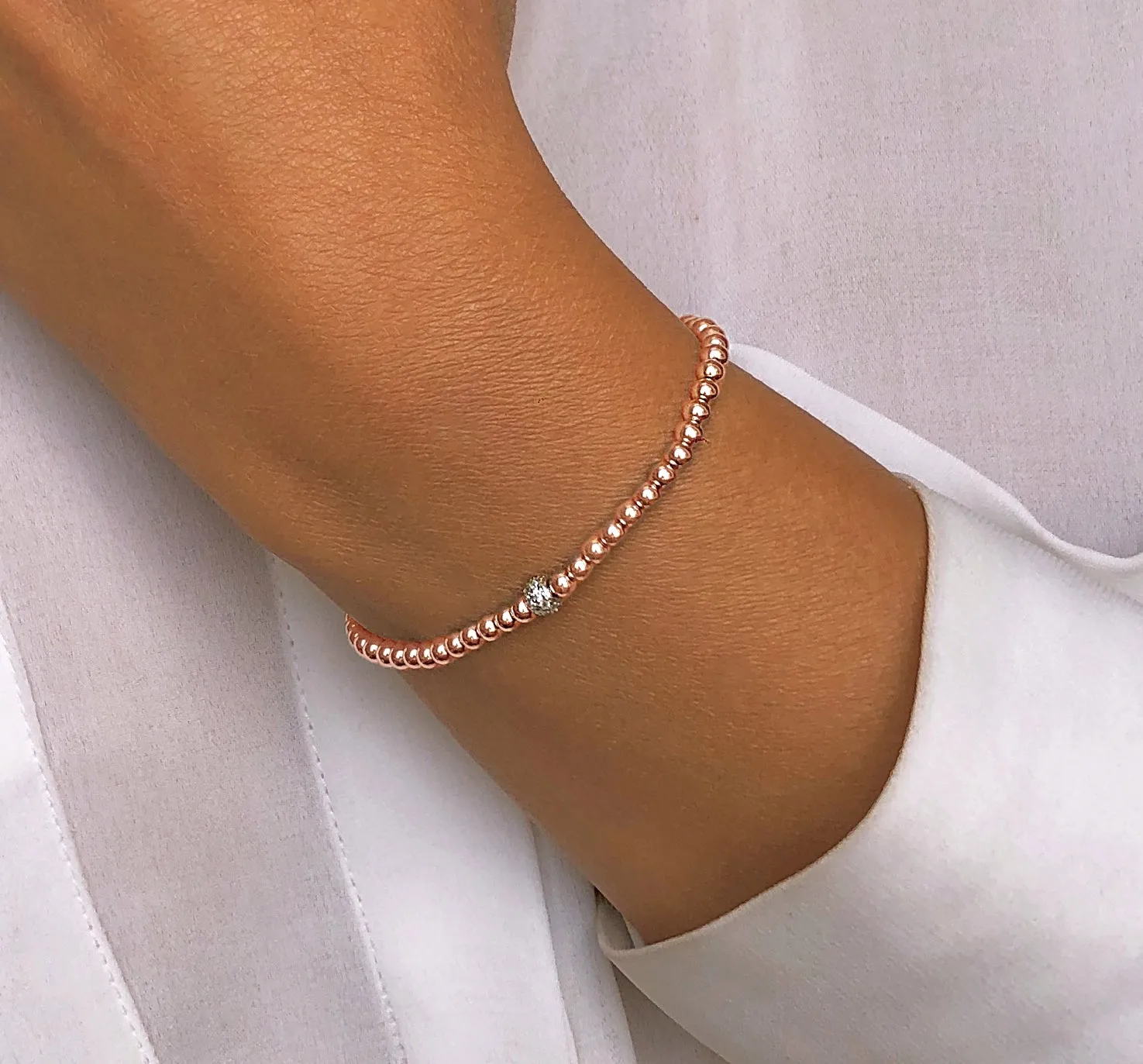 Bracelet in 925 silver gilded with 18k rose gold assembled with zirconium oxide