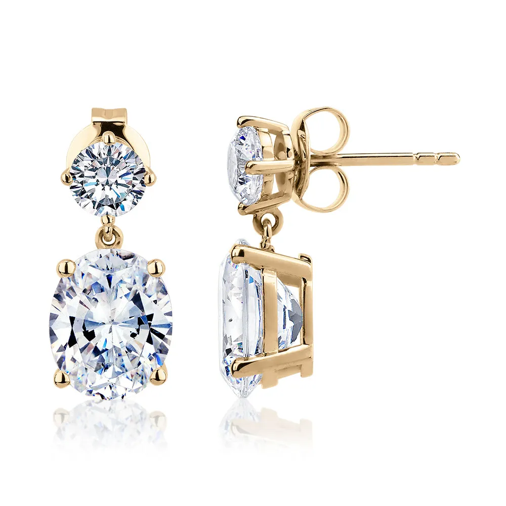 Oval and Round Brilliant drop earrings with 6 carats* of diamond simulants in 10 carat yellow gold
